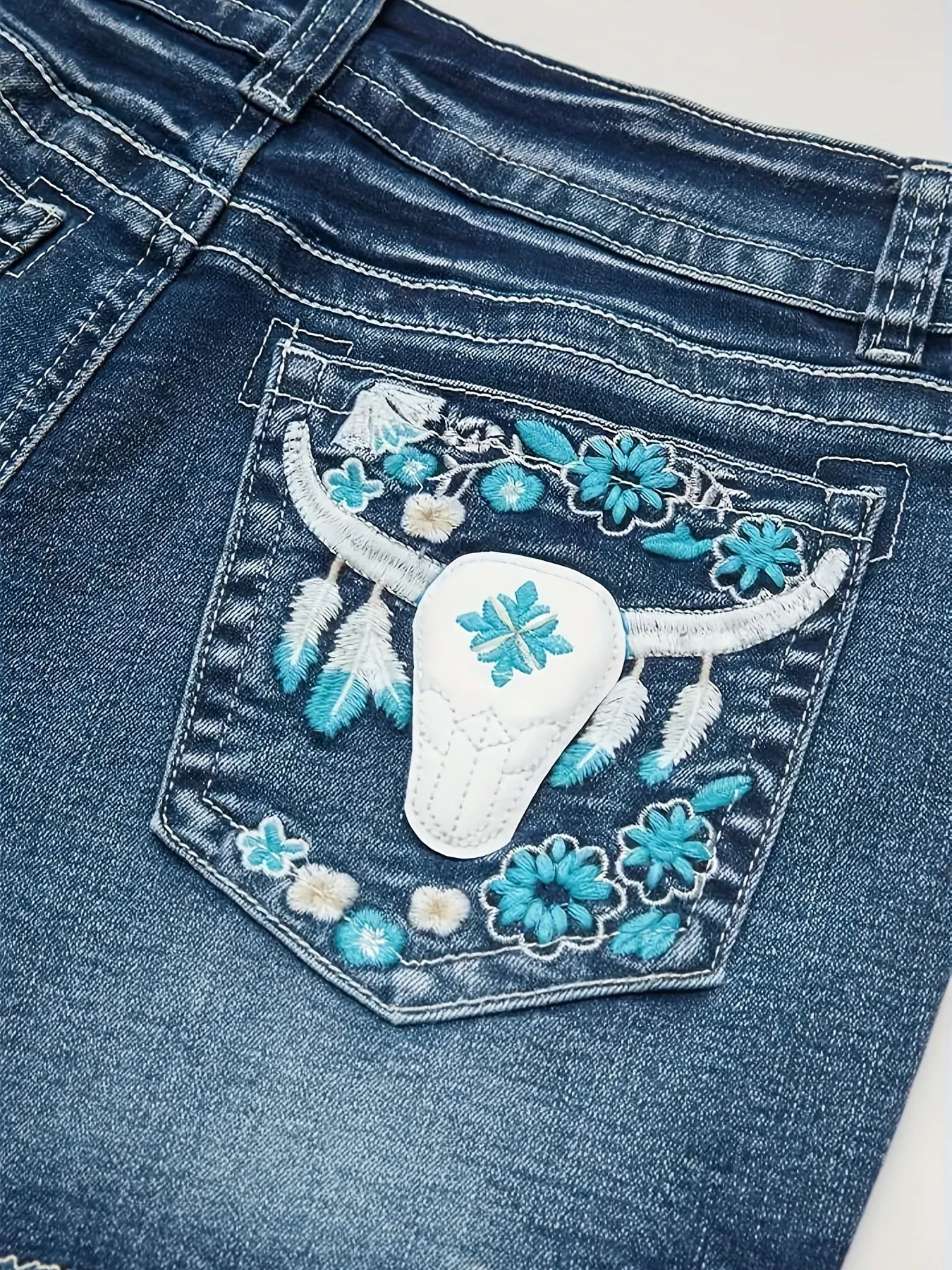 Stylish Bull Floral Embroidered Denim Shorts - Fashionable Casual Style, Frayed Hem, Functional Pocket Detailing, Comfortable Summer Fashion Essentials for Women